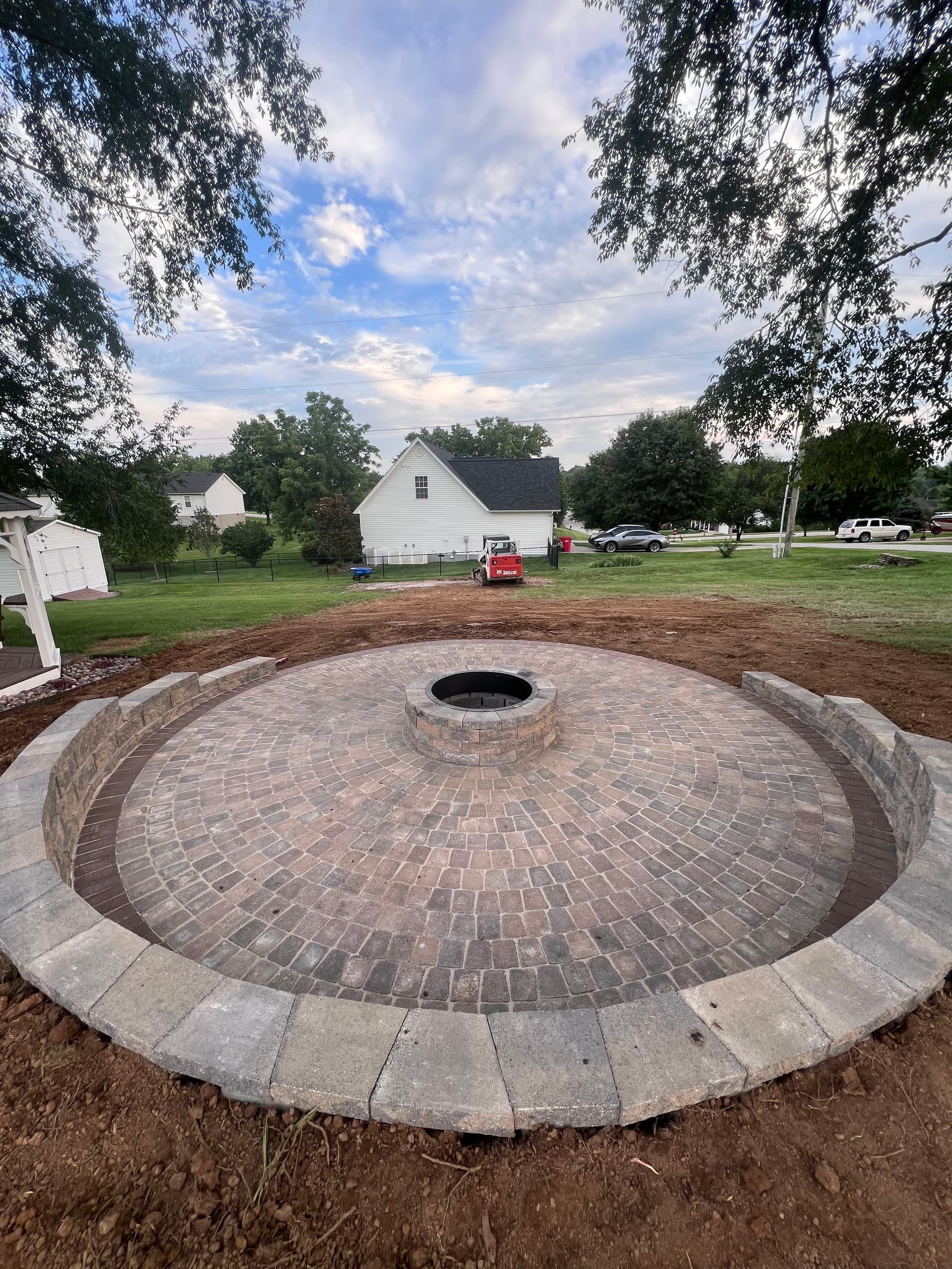 Gallery photos for Round Paver Patio with Built-In Fire Pit and Seating Wall: Image #1